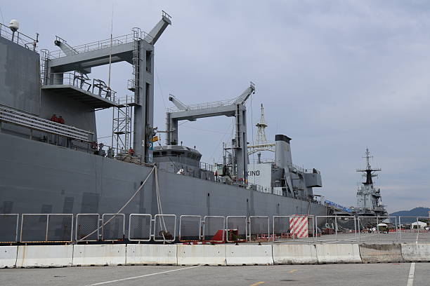 istock A naval ship docked in a port 2244341795