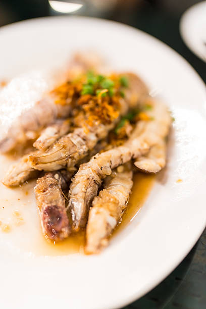 Stir-fried mantis shrimp or crayfish with garlic topping