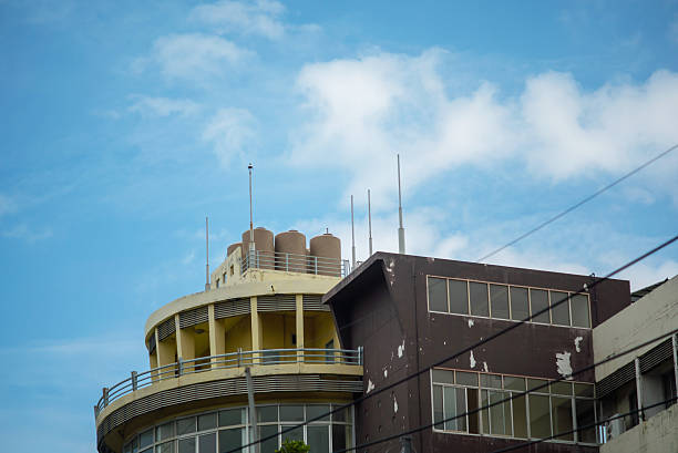 istock Modern Building with Water Tanks on Roof 2244345485