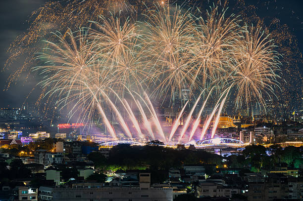 istock Colorful fireworks with a reflection on the water for celebration is beautiful at night, seen in the New Year holidays, Christmas events. ‘Vijit Chao Phraya’ Bangkok, Thailand 2244346162