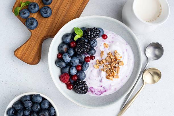 istock Blueberry acai yogurt bowl with berries 2244346264