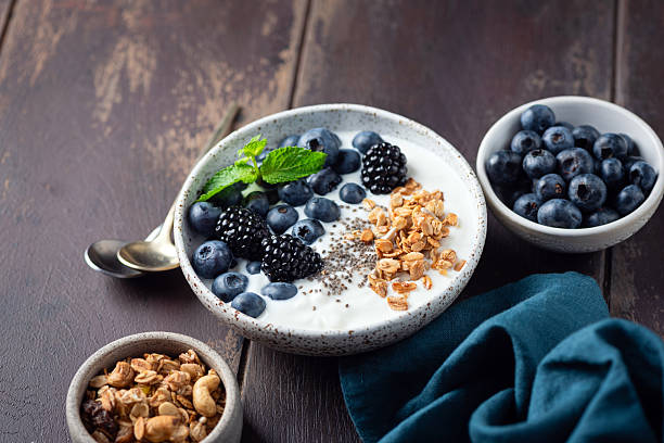 istock Greek yogurt bowl with berries, granola 2244346266