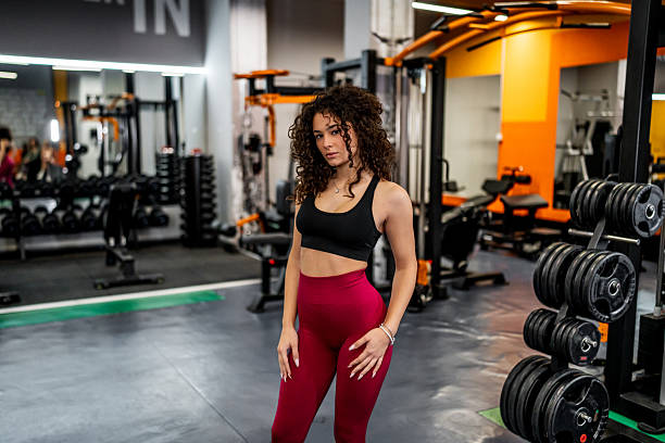 istock Woman posing in gym, ready for workout 2244352227