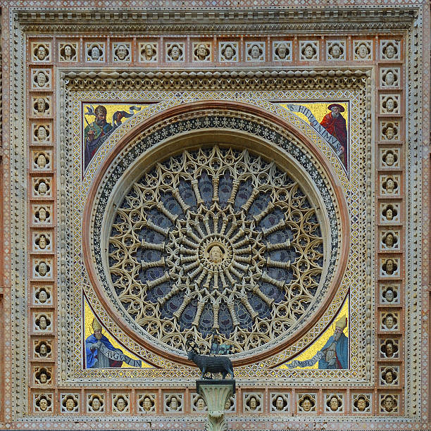 Orvieto Cathedral - rosette or rose window, a circular decorated window, typical of Gothic churches in Europe. 14th-century cathedral situated of Umbria, central Italy