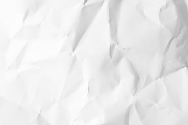 istock Medium creases of medium bright white crumpled paper used in background illustration. 2244360757