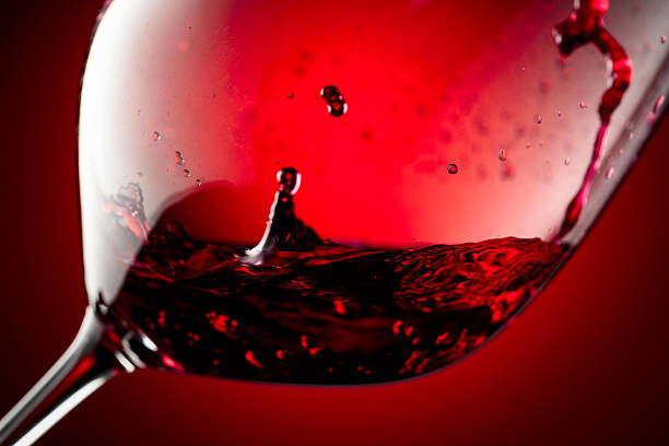 istock Red wine is poured into a glass. 2244360897