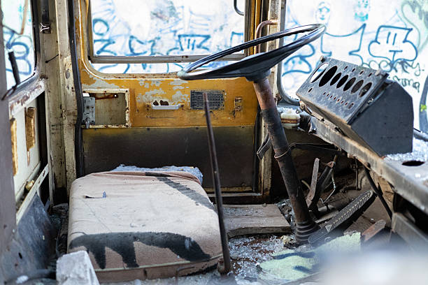 istock Abandoned crane truck interior with broken dashboard and worn seat 2244366066