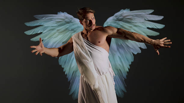 istock Renaissance-style warrior angel concept: powerful male figure in classical white robe. 2244368282
