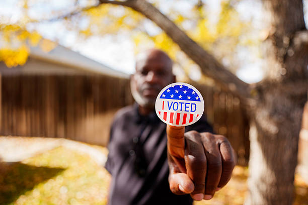 istock “I Voted” sticker close-up in yard 2244369140