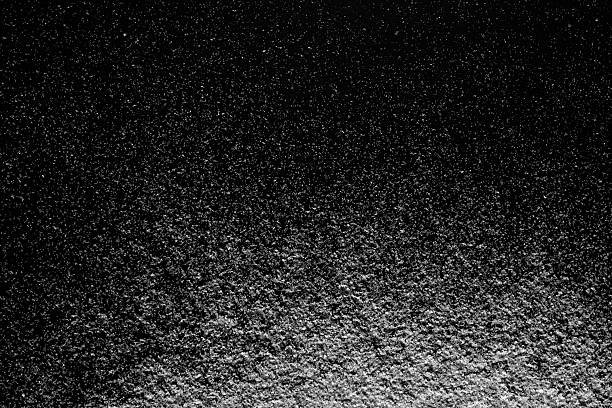 white snow on the black background