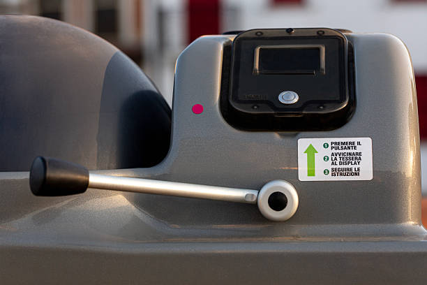 istock A close-up of a modern trash can that opens with a special card. Control panels with buttons and levers explain how to use the can. 2244379288