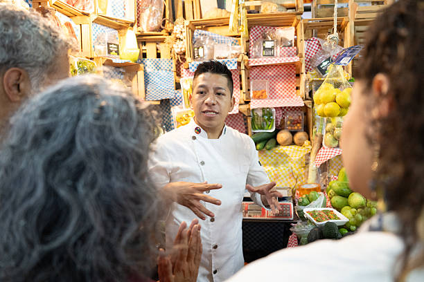 Chef leading a culinary tour in a Mexican Market