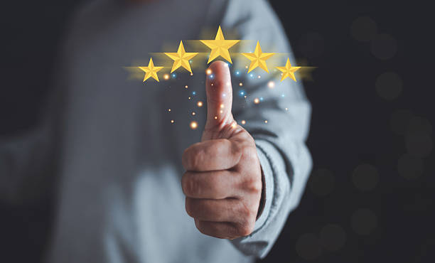 istock Customer hand thumbs up for excellence rate, Customer evaluation feedback and satisfaction survey concept, Five stars satisfaction rating, the best rating satisfaction for products and services. 2244385884