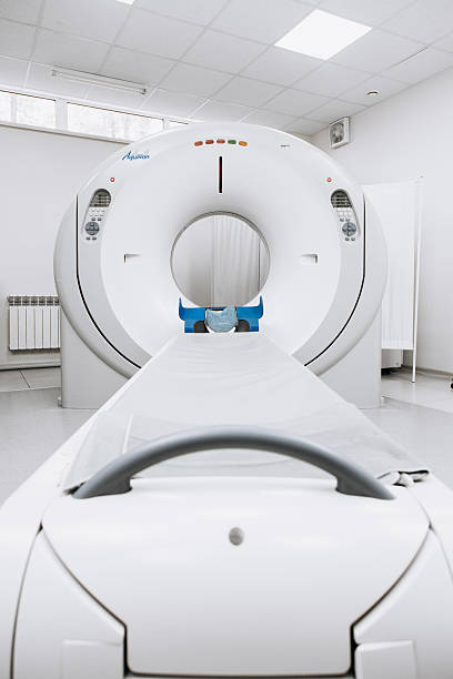 istock Modern CT scanner positioned in a clinical environment 2244386689