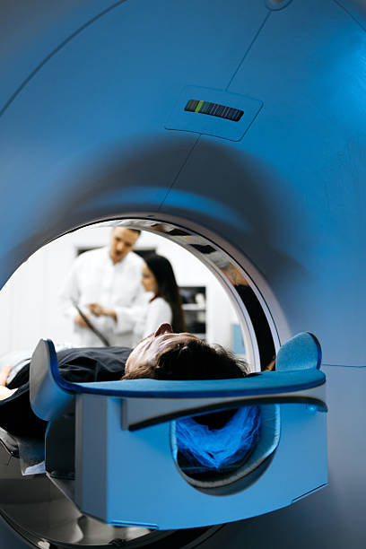 istock Individual positioned for CT scan in a contemporary medical setting 2244386788