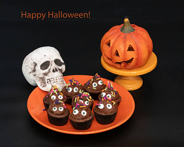 istock Happy Halloween with Skull, Pumpkin and Eye Filled Chocolate Cupcakes 2244390438