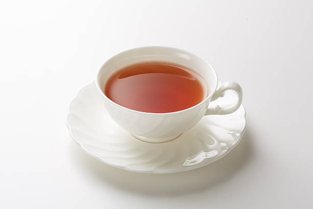 istock Image of warm tea on white background 2244390883