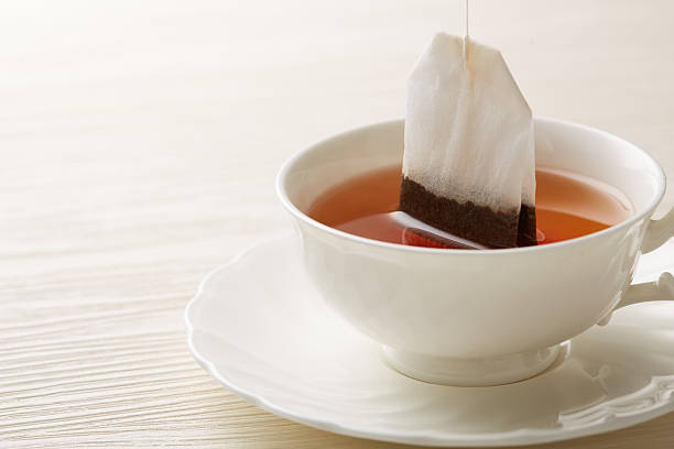 Hot chamomile green tea from bag in a cup.