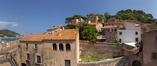istock Stone houses with tiled roofs in Tossa de Mar Spain 2244393297