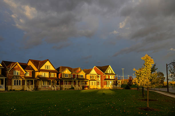 Photo was taken on Halloween ,Oct 31 2025 - dramatic sunset on new homes in the community at the eastern end of Markham, a suburban town in the north of cosmopolitan Toronto area.