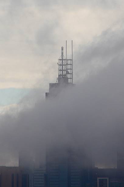istock Melbourne tower covered in fog at dawn 2244397814