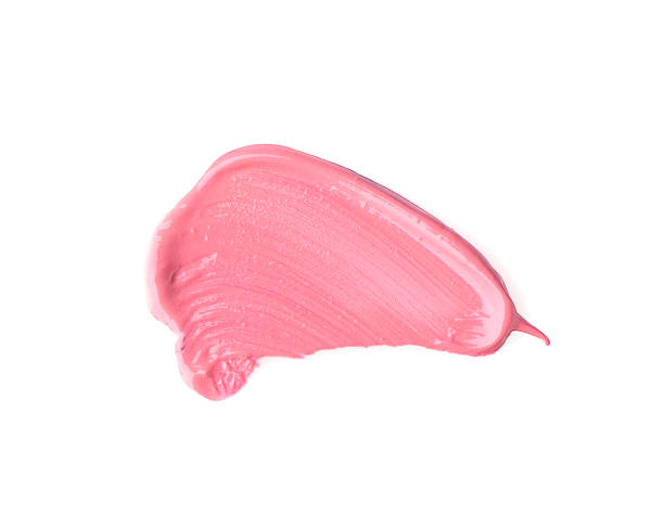 istock Stroke of pink lip gloss isolated on white, top view 2244398964