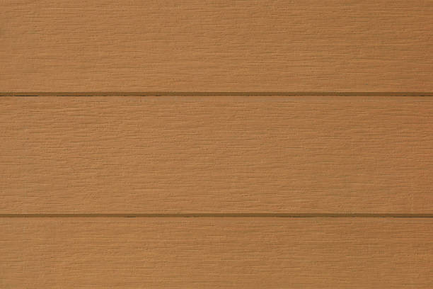 This horizontal brown wood background provides a warm, natural, and rustic texture, perfect for farmhouse decor concepts or nature-themed designs.