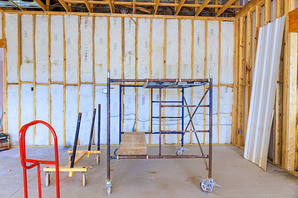 istock Scaffolding setup in partially constructed interior space with wooden framing unfinished walls 2244405105