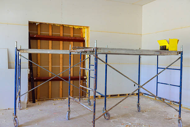 istock Construction area showing scaffolding renovation in room with exposed walls 2244405398