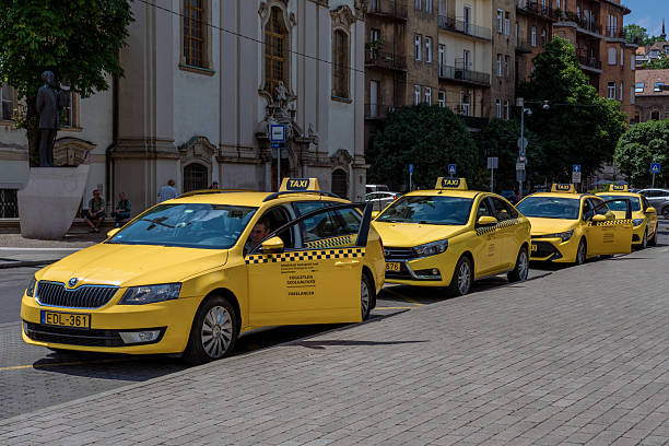 This is a taxi rank with drivers awaiting customers in the city centre are on June 08, 2022 in Budapest, Hungary