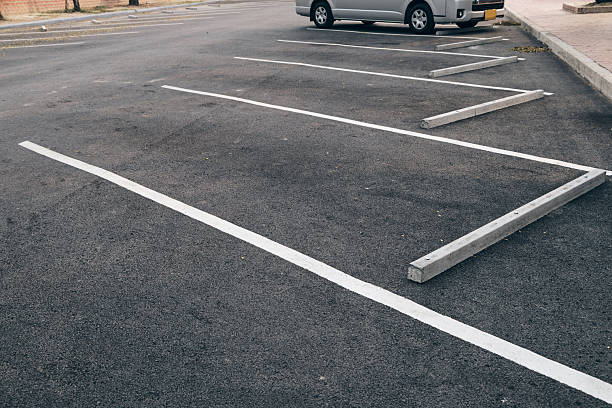 istock Park lot car empty street. 2244410878