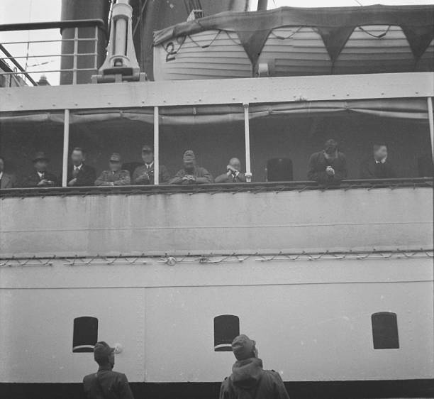 istock Japanese military personnel boarding a ship for a temporary return to Japan, during Second Sino-Japanese War, in the Republic of China - 1939 2244411141
