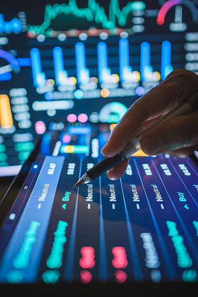 istock The power of AI-driven analytics: A professional leverages smart devices to optimize business and finance manage an investment portfolio with real-time financial data 2244411710