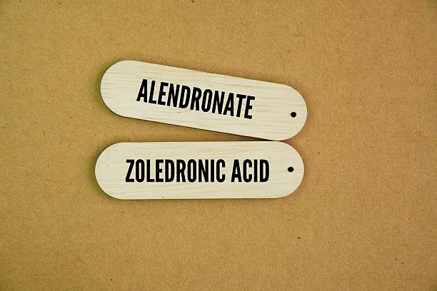 istock Word Alendronate and zoledronic acid are both bisphosphonate 2244411830