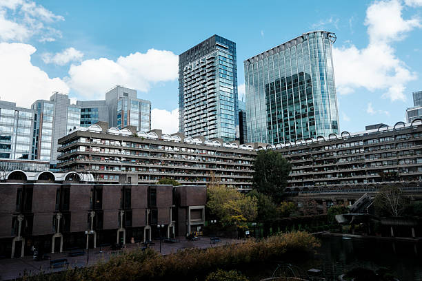 istock Barbican centre contrasting brutalist architecture with modern london skyscrapers 2244413785