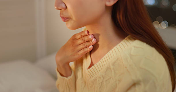 istock Asian female get cold sore throat home 2244416764