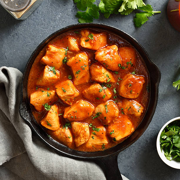 istock Sweet and spicy chicken breast with sauce, top view 2244423848