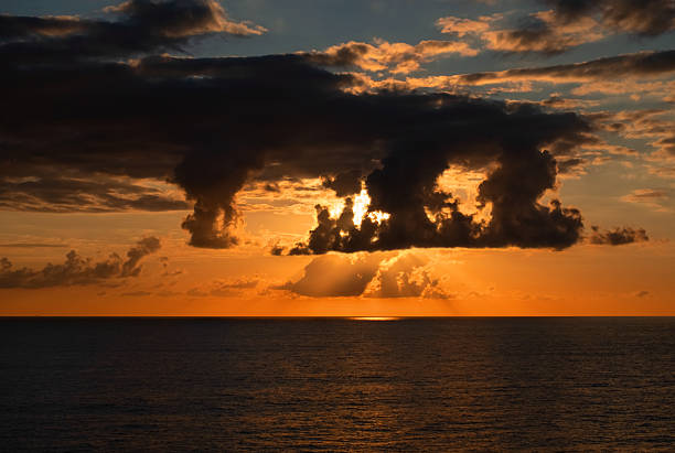 Sunset and dramatic cloudscape over the Mediterranean Sea.