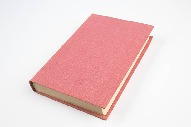 istock Open bright pink book isolated on white background. 2244439624