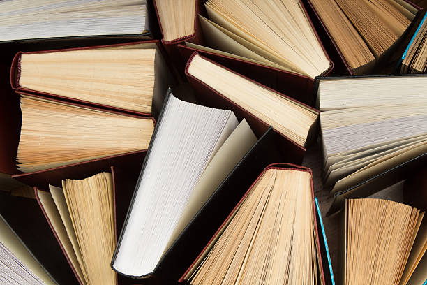 istock Background from old and used hardback books. Copy space for text. 2244439627