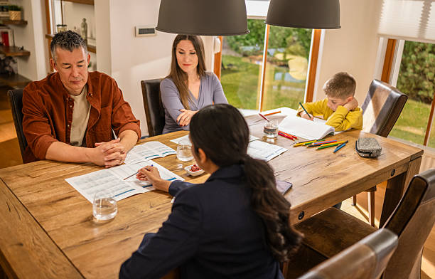 istock Real estate agent explaining leasing agreement to clients 2244442399