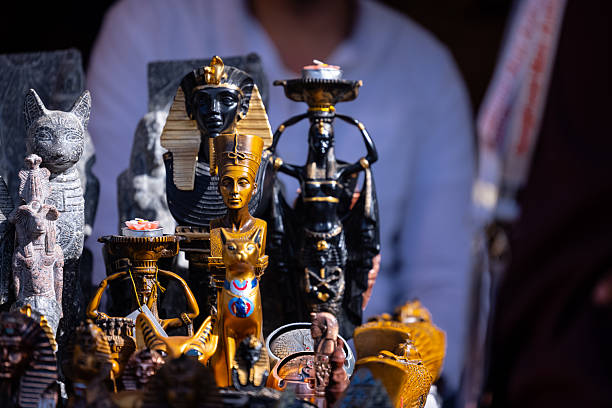 Handmade idol of egyptian mummy souvenir at shop for same in fair.