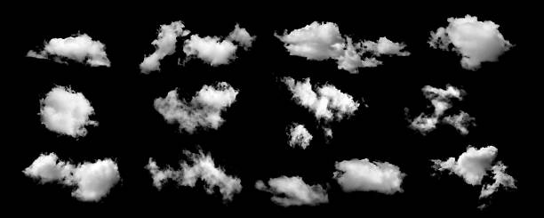 istock Realistic isolated cloud set on black background, perfect for sky replacement, and graphic design projects. High-resolution fluffy clouds with soft edges for photo compositing and effects. 2244444515