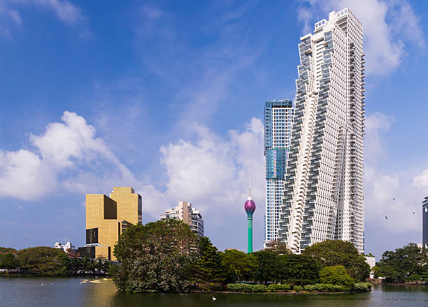 Colombo city skyline with skyscraper towers under blue cloudy sky on a sunny day