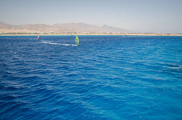 istock Windsurfing adventure on vibrant blue Red Sea 2244445501