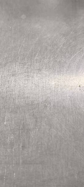 istock Used stainless steel sheet has scratches. 2244445750