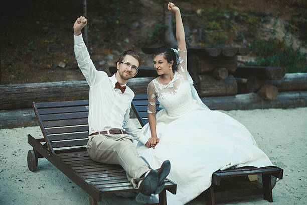 bridal couple holding hands during ceremony in church