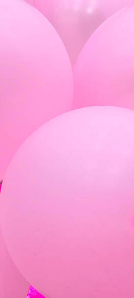 istock Bright pink balloons as background. Celebration concept. 2244450915