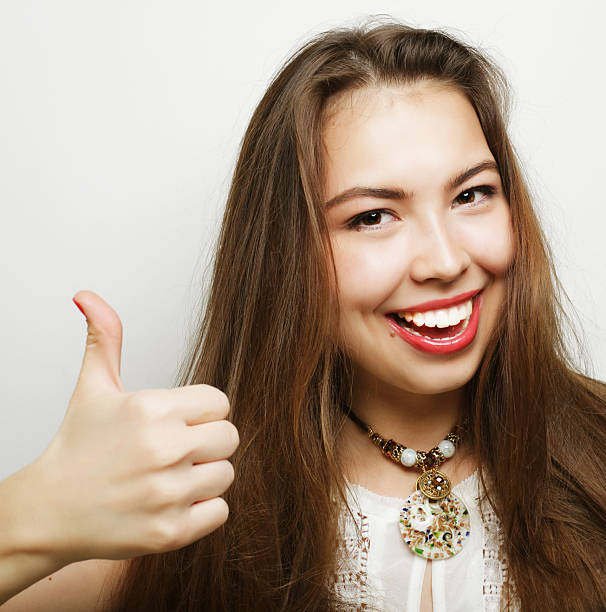 istock Beautiful young surprised woman. Studio shot. 2244454293