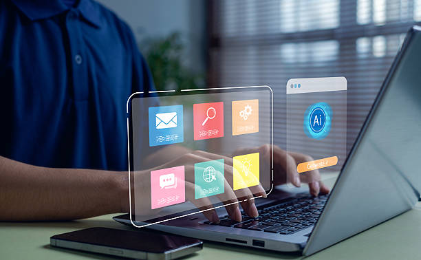 istock Man working on laptop with AI generate button and colorful virtual app icons for communication, search, and technology in modern office. Artificial intelligence and digital interface concept. 2244465024